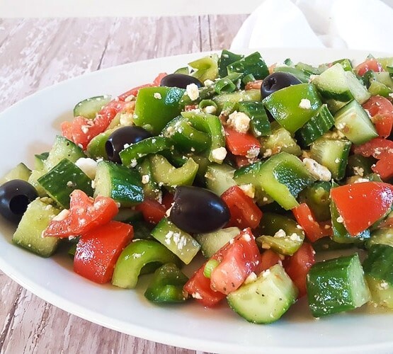 This Greek Salad recipe is full of hearty and bold flavors, but it's a cinch to pull together. Serve it as a side dish or even as a light dinner!