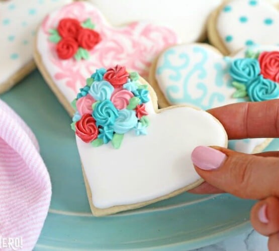 cute heart shaped cookie flowers with flowers