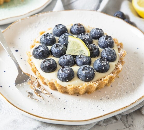 These refreshing, no-bake Lemon and Blueberry Tartlets are packed with citrus goodness and topped with juicy blueberries creating one amazing Summer dessert!