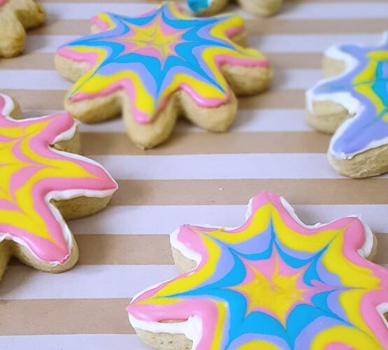 Tie dye sugar cookies are a fun and delicious way to celebrate the colors of summer!