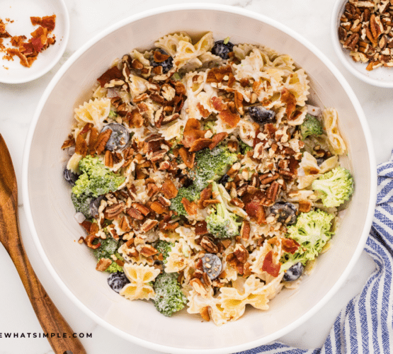 Finished dish of Broccoli Grape Pasta Salad in a white bowl