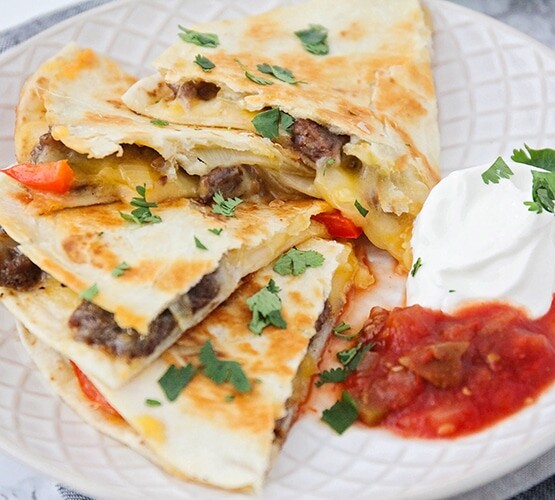 slice of a fajita quesadilla on a plate