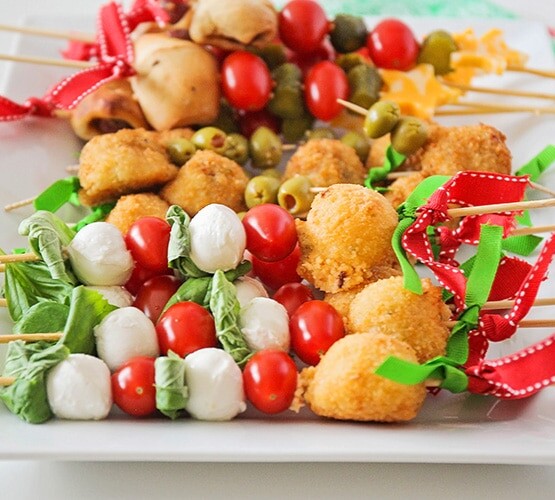 holiday decorated antipasto skewers on a tray