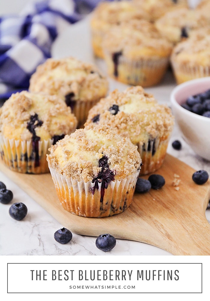 The best blueberry muffins recipe ever! Fluffy muffins stuffed with fresh blueberries topped with a delicious crumb topping, these homemade blueberry muffins are soft, sweet, and so simple to make! via @somewhatsimple