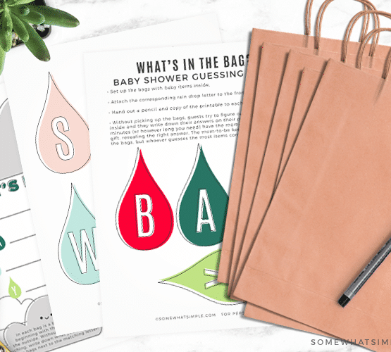 a printable baby shower game entitled what's in the bag with the free printable with each letter in baby shower as well as brown bags with a letter attached to it.