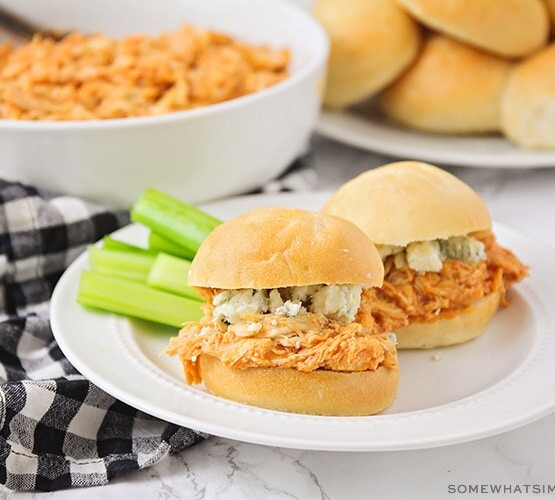 buffalo chicken sliders with ranch dressing and celery sticks