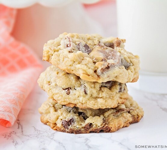 a stack of turtle oatmeal cookies on a counter