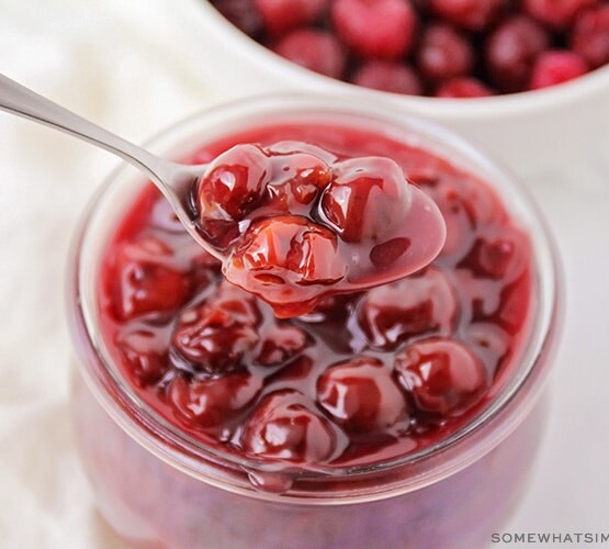 a spoon full of cherry pie filling