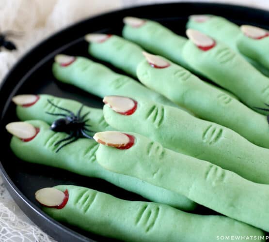 witch finger cookies on a black tray