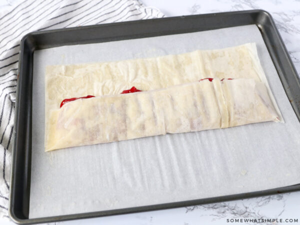folding filo dough over cherry pie filling