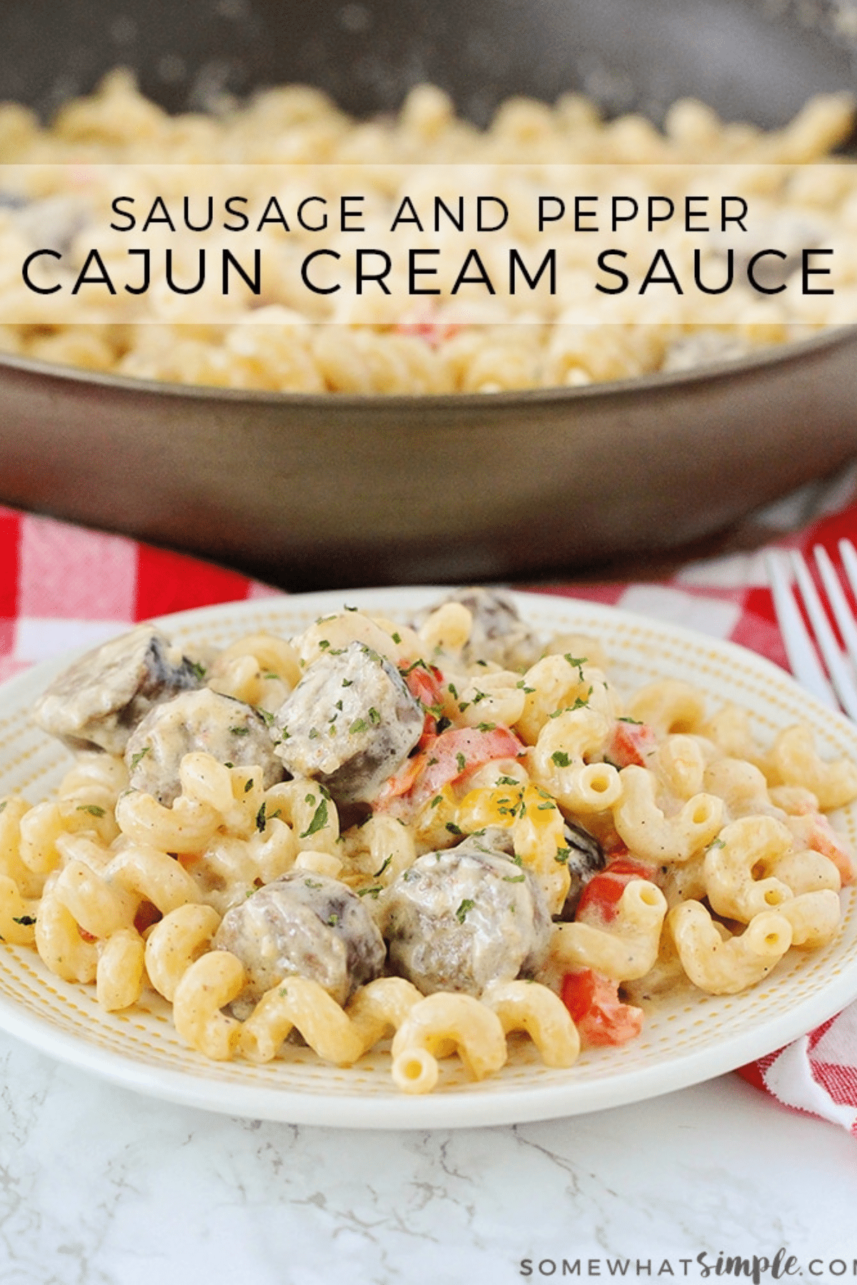 This rich and creamy Cajun Cream Sauce Pasta is quick and easy to prepare. Loaded with sausage and pepper this recipe is FULL of flavor! via @somewhatsimple